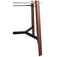 Walnut wood legs with black metal supports and a light marble top, showcasing contrasting colors and sleek lines.