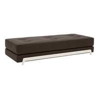 Modern dark brown upholstered sofa bed with tufted cushioning and sleek silver metal base. Ideal for stylish interiors.