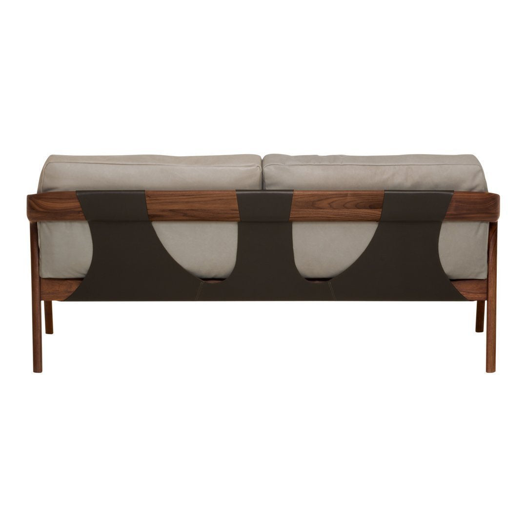 Modern sofa in beige and dark brown, featuring a unique curved pattern on the backrest for a stylish touch.