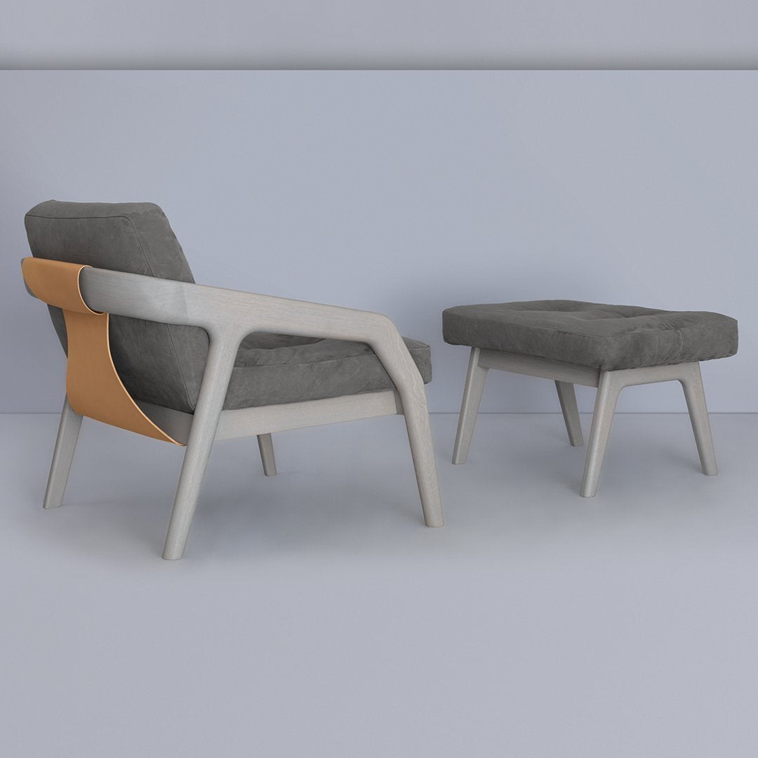 Gray upholstered chair and ottoman with cream and light wood accents, featuring a smooth, modern design.