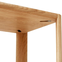 Natural oak wood with a smooth finish, showcasing subtle grain patterns and a minimalist design.