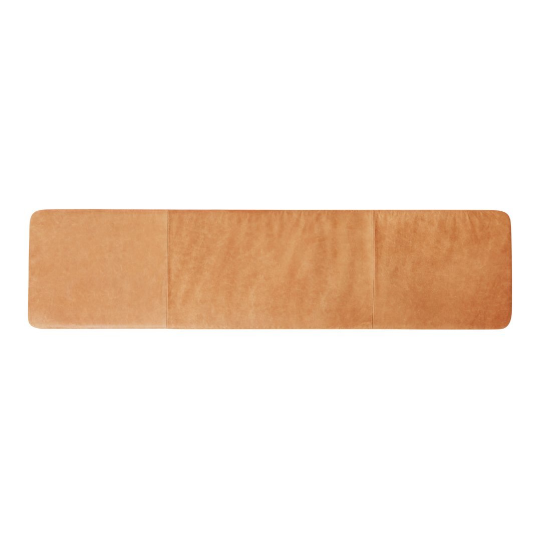 Soft tan suede runner in a smooth, minimalist design, perfect for adding warmth to any space.