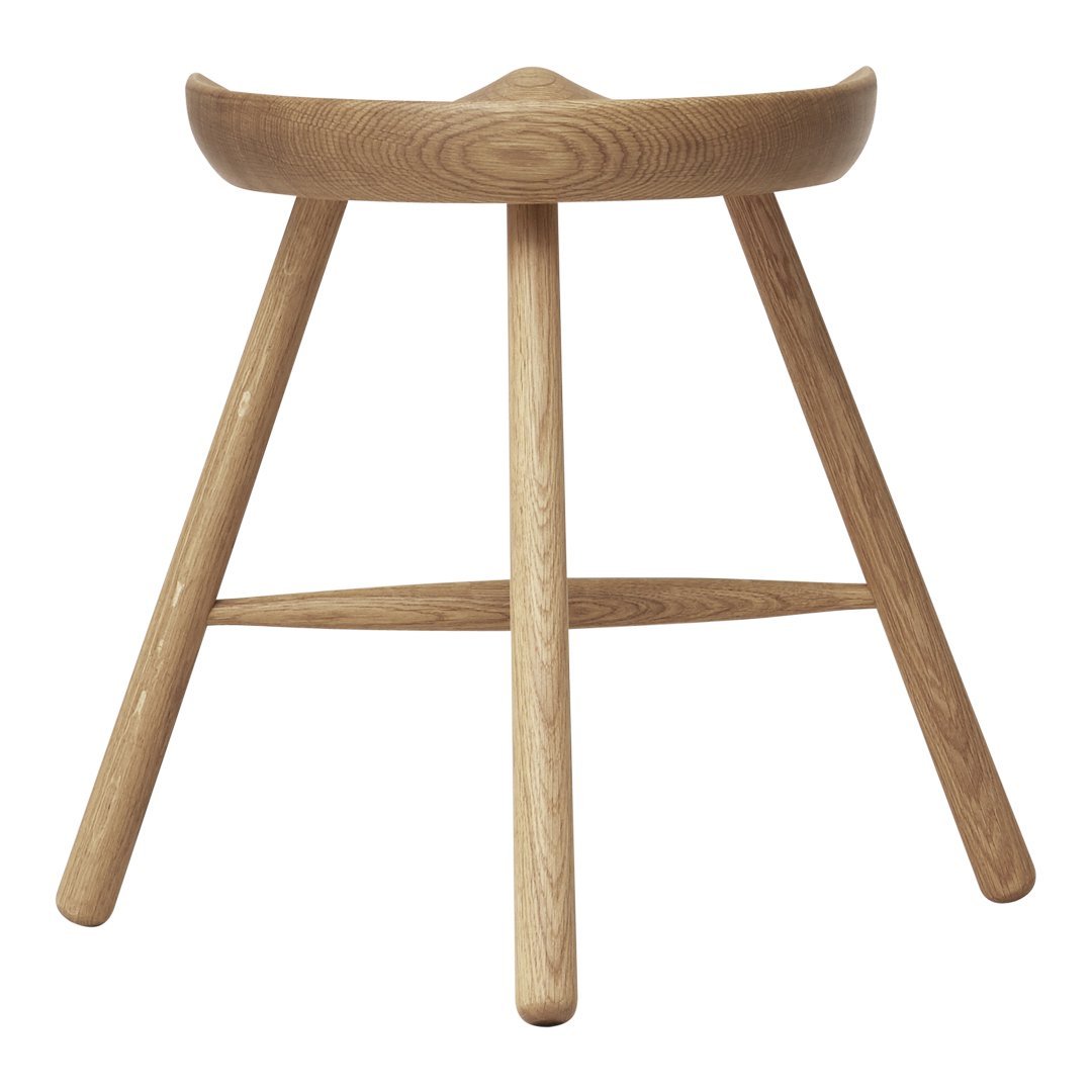 Light natural wood stool with a smooth finish and simple, minimalist design, highlighting its warm, organic tones.