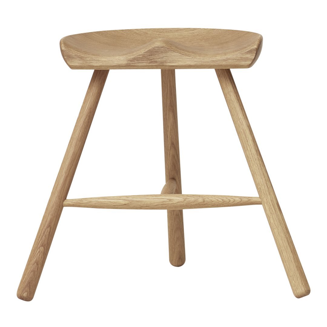 Light oak wood stool with a smooth, natural finish and simple, modern design. No visible patterns.