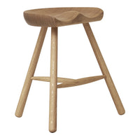 Natural wood stool with a smooth, light oak finish and minimalist design, featuring simple grain patterns.