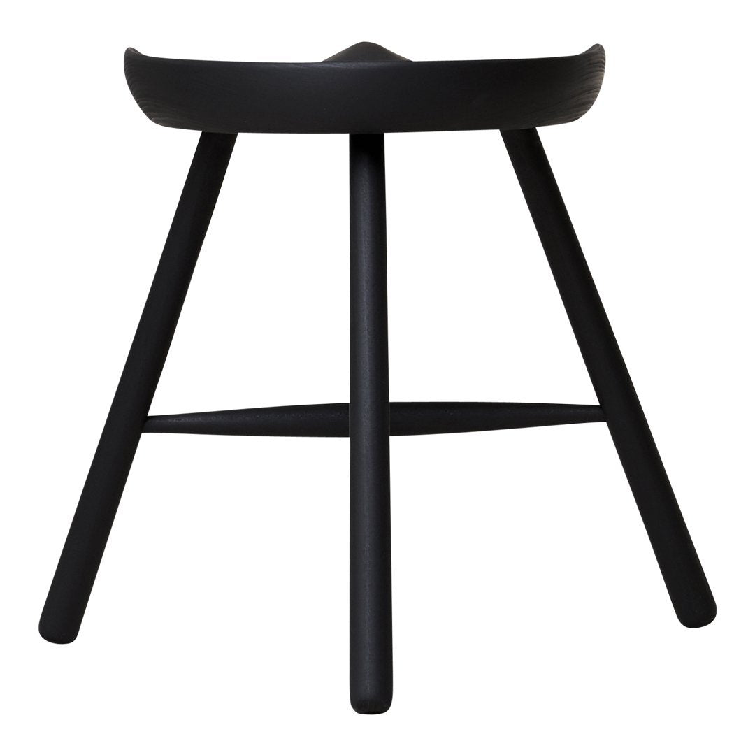 Black minimalist stool with smooth matte finish and simple angular design. Ideal for modern decor.
