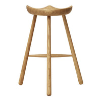 Natural wood bar stool with a smooth, light oak finish and minimalist design, showcasing elegant curves and clean lines.