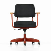 Black fabric office chair with orange metal frame and wooden armrests, featuring a modern minimalist design.