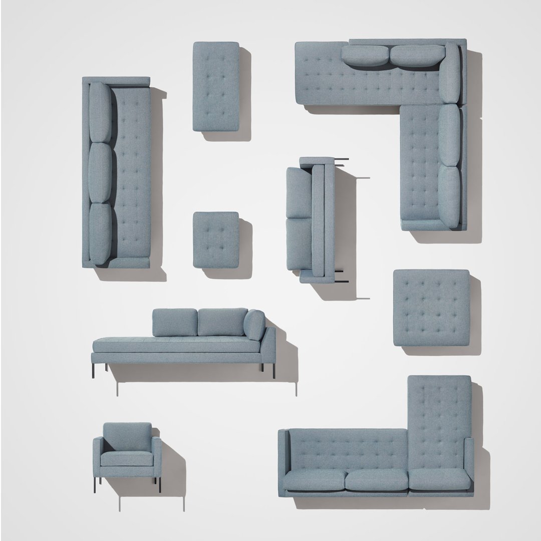 Various modern gray sofas and seating options with tufted upholstery and sleek designs.