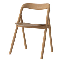 Natural wood chair with a smooth finish, featuring clean lines and a minimalist design. Perfect for modern decor.