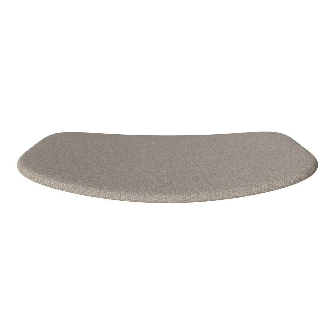 Beige curved countertop mat with a smooth, solid texture, ideal for modern kitchen aesthetics.