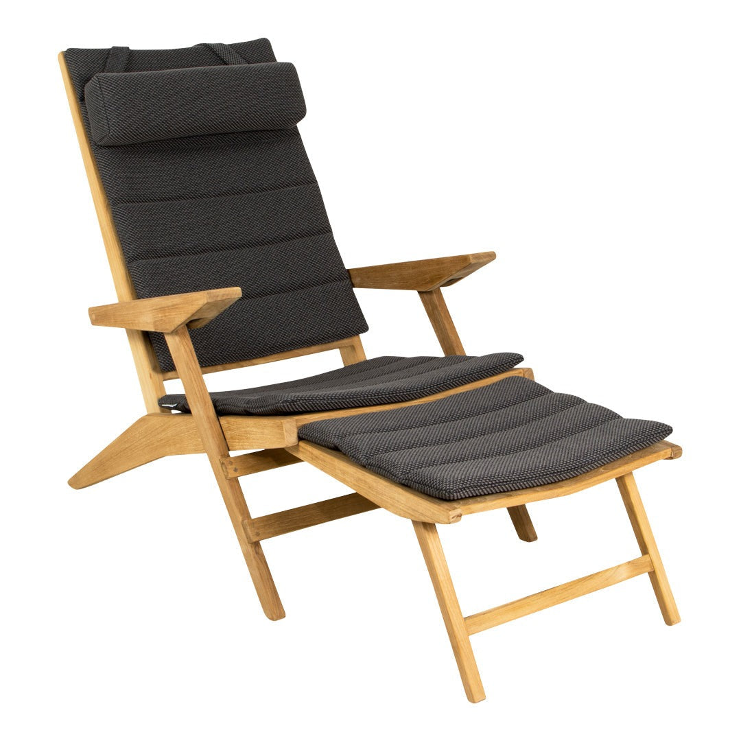 Black padded lounge chair with matching footrest and natural wood frame. Modern design for stylish indoor or outdoor use.