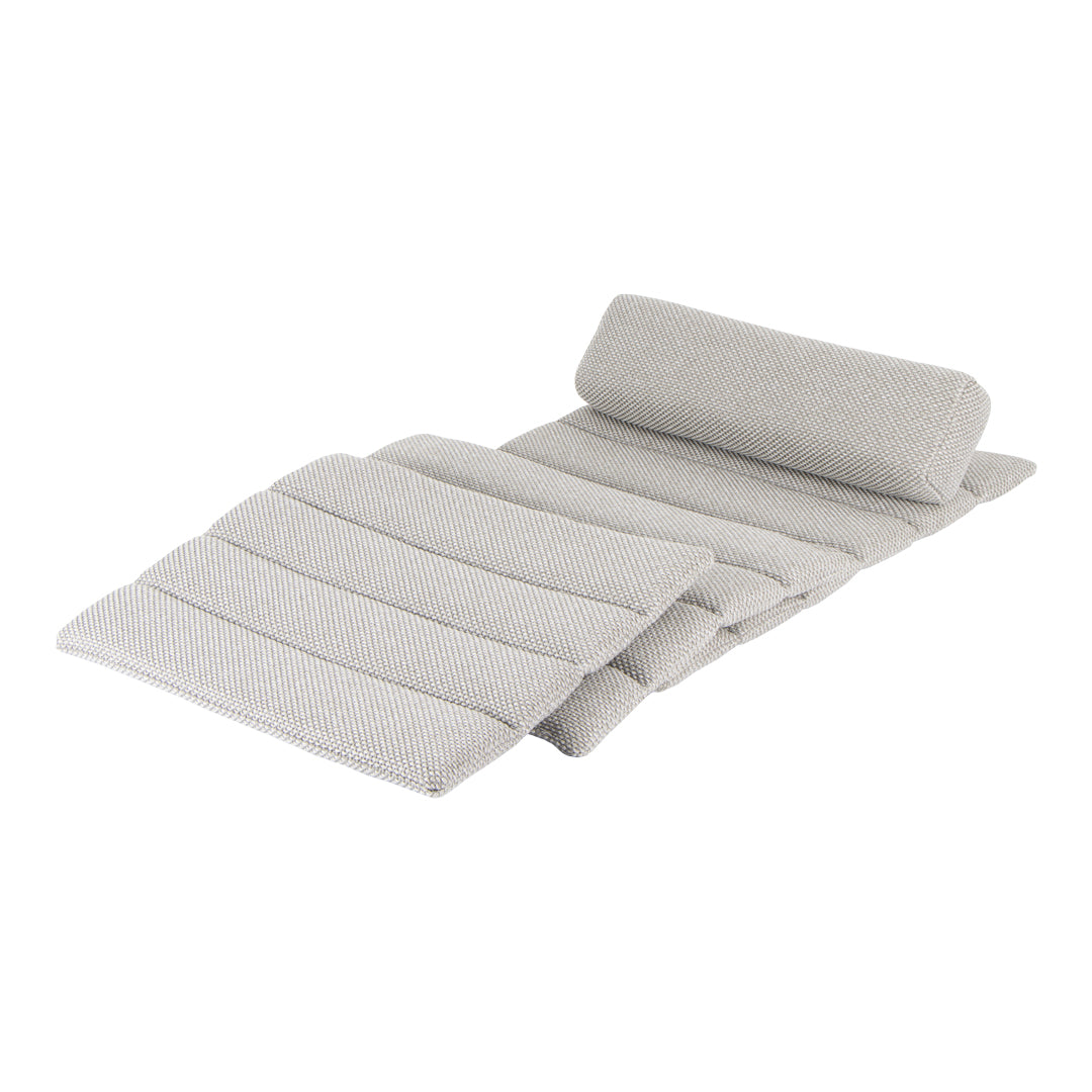 Light gray outdoor cushion with a textured striped pattern and rolled headrest for added comfort.