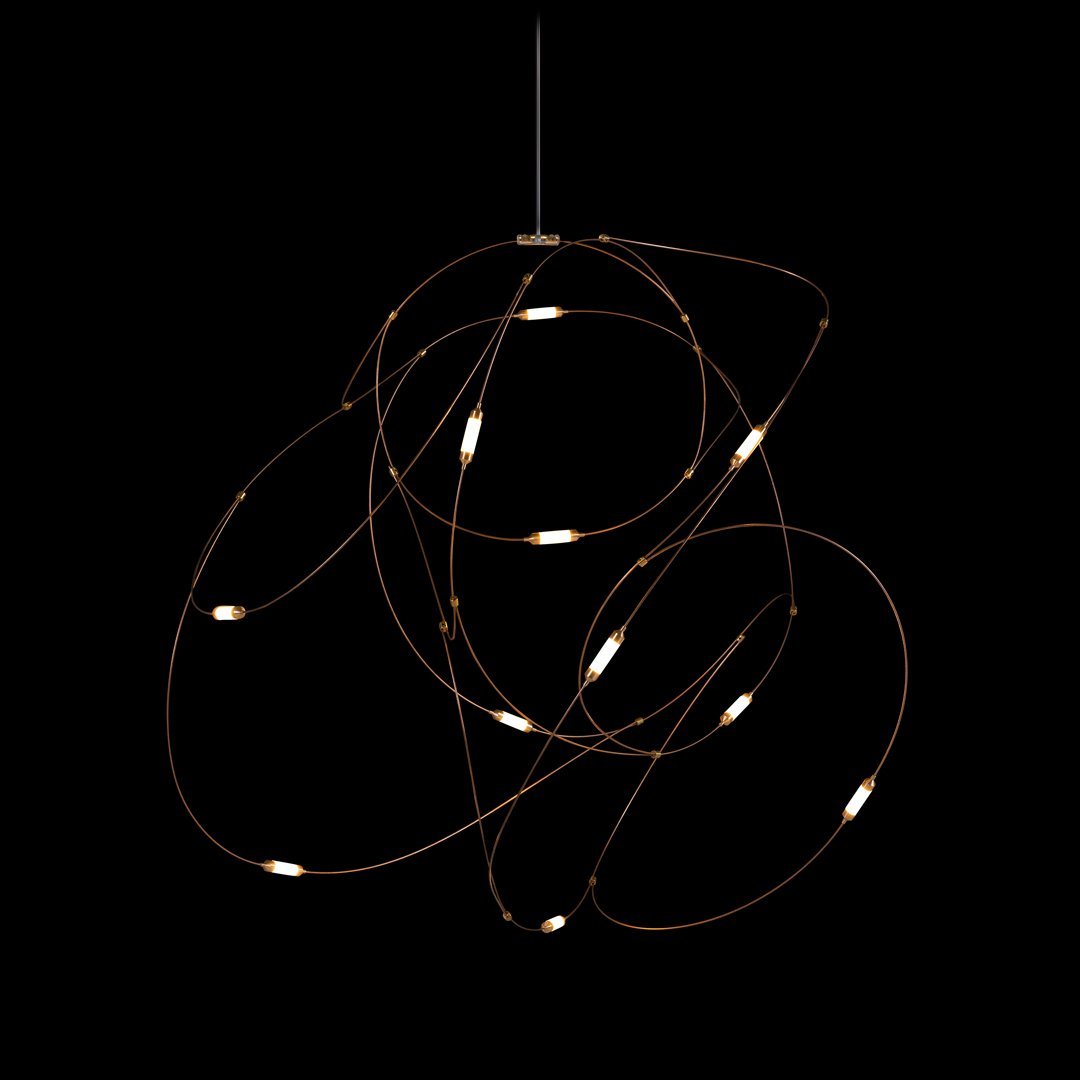 Modern pendant light with an intricate copper wire pattern and warm white LED accents. Elegant against a black background.