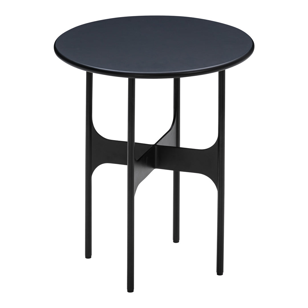 Round black side table with sleek legs and minimalistic design, perfect for modern decor.