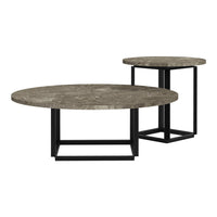 Set of two round coffee tables with gray stone tops and sleek black metal bases. Modern and stylish design.