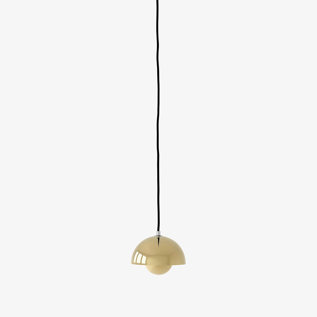 Minimalist pendant light in soft beige with a glossy finish and black cord, ideal for modern decor.