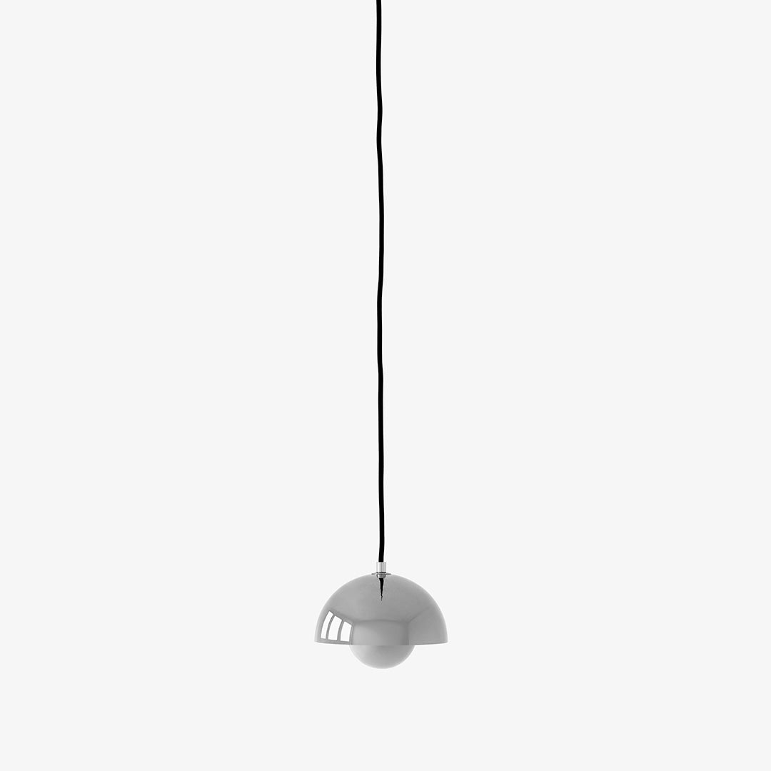 Gray pendant light with a minimalist design and black cord, featuring a sleek, curved shade.