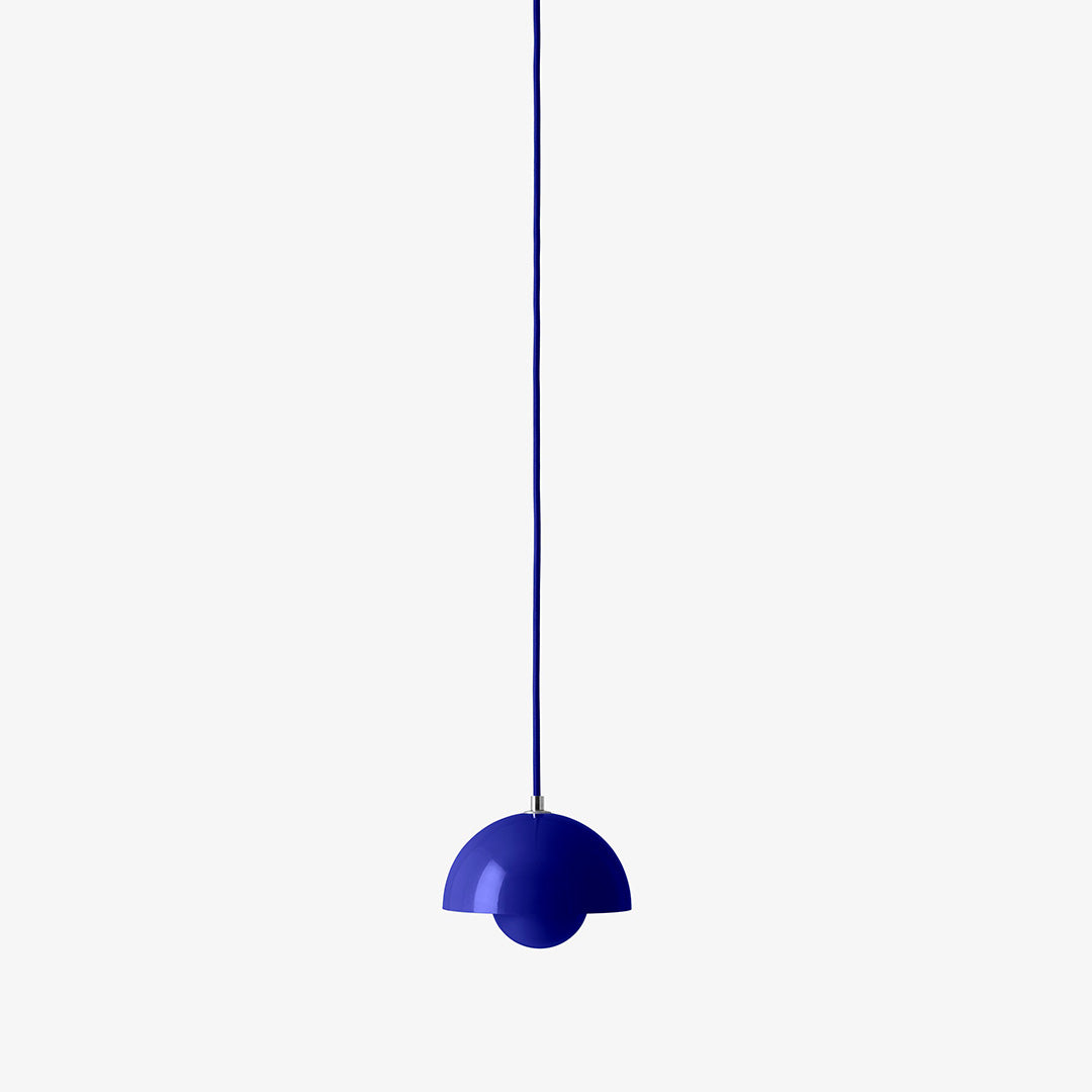 Sleek blue half-dome pendant light with a matching hanging cord on a minimalist background.
