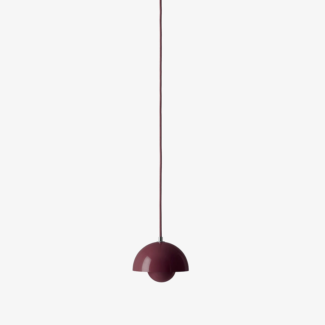 Modern burgundy pendant light with a sleek, minimalistic design and smooth, glossy finish. Perfect for stylish decor.