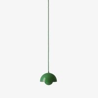 Green pendant lamp with a minimalist half-sphere design, featuring a smooth, glossy finish.