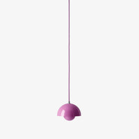 Hanging lamp in vibrant pink with a sleek, minimalist design and smooth, glossy finish.