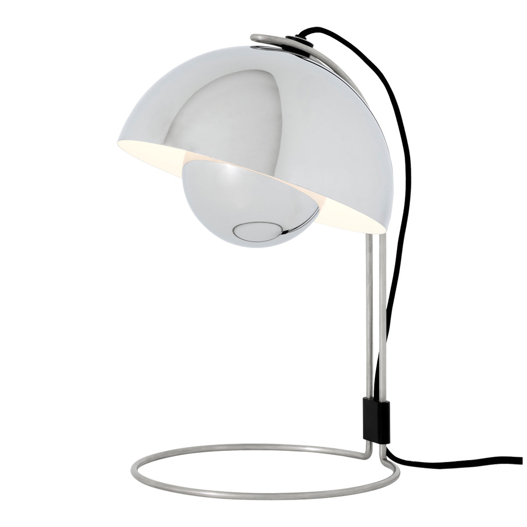 Sleek chrome lamp with a smooth spherical shade and minimalist silver base, featuring clean lines and modern aesthetic.