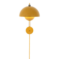 Yellow dome-shaped wall lamp with a sleek design and matching cord, offering a bright pop of color for modern spaces.