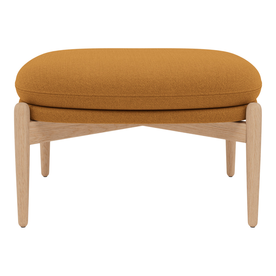 Modern ottoman with a warm mustard yellow cushion and light wood legs, featuring a minimalist design.