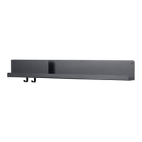 Black wall shelf with a minimalist design, featuring a smooth surface and two hooks for hanging.