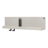 Light gray wall shelf with a smooth surface and black hooks, featuring a minimalist design.