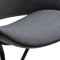Gray textured fabric chair seat with a smooth curved design and black metal legs. Elegant and modern look.