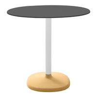 Stylish black round tabletop with a white pole and a soft yellow base, perfect for modern decor.