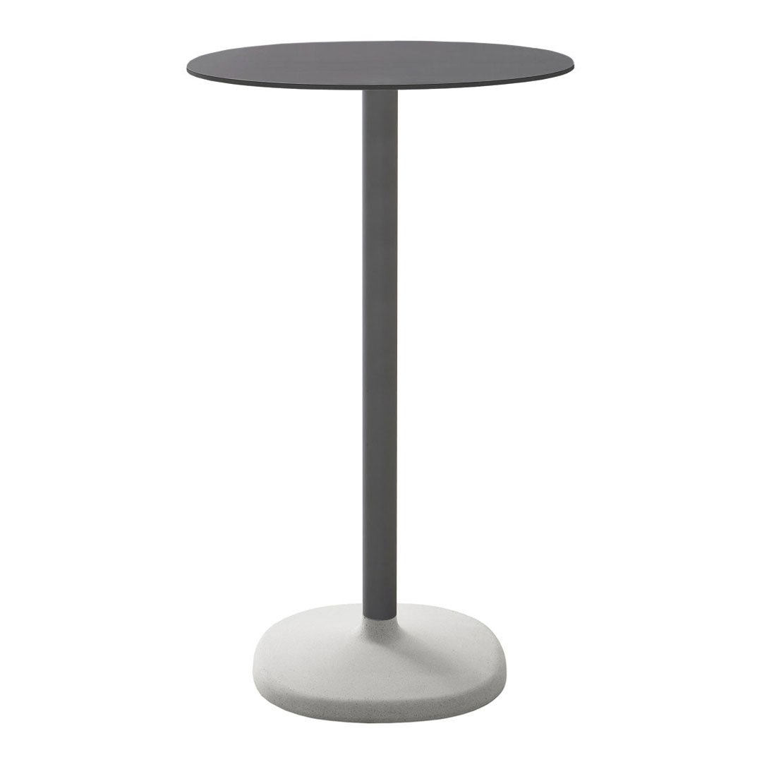 Modern black round table with a sleek gray base, perfect for minimalistic interiors.