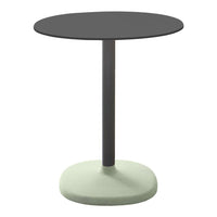 Black round tabletop with a sleek gray stem and a light green circular base. Modern and minimalist design.