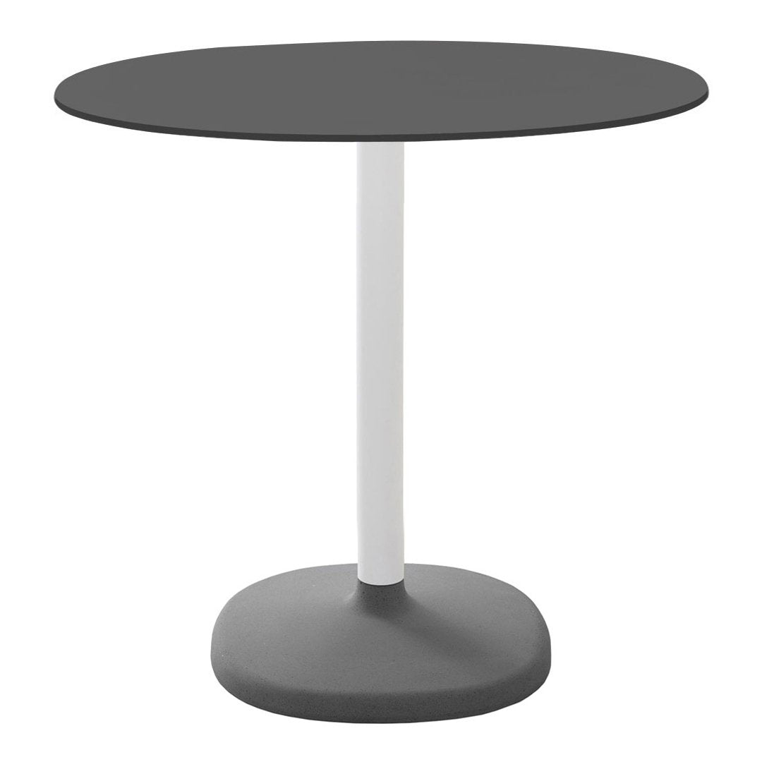 Round black tabletop with a sleek white pole and gray base, offering a modern and minimalist design.