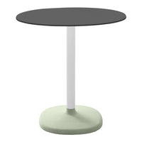 Round table featuring a matte black top and a light green base with a sleek white pole. Perfect for modern decor.
