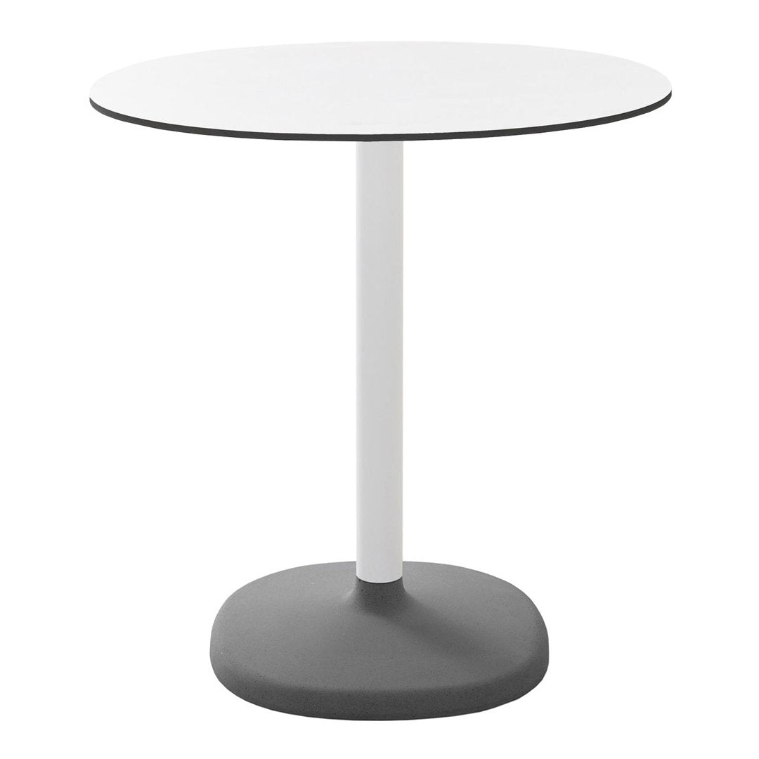 Round table with a sleek white top, contrasting black edge, and a sturdy gray base. Modern, minimalistic design.