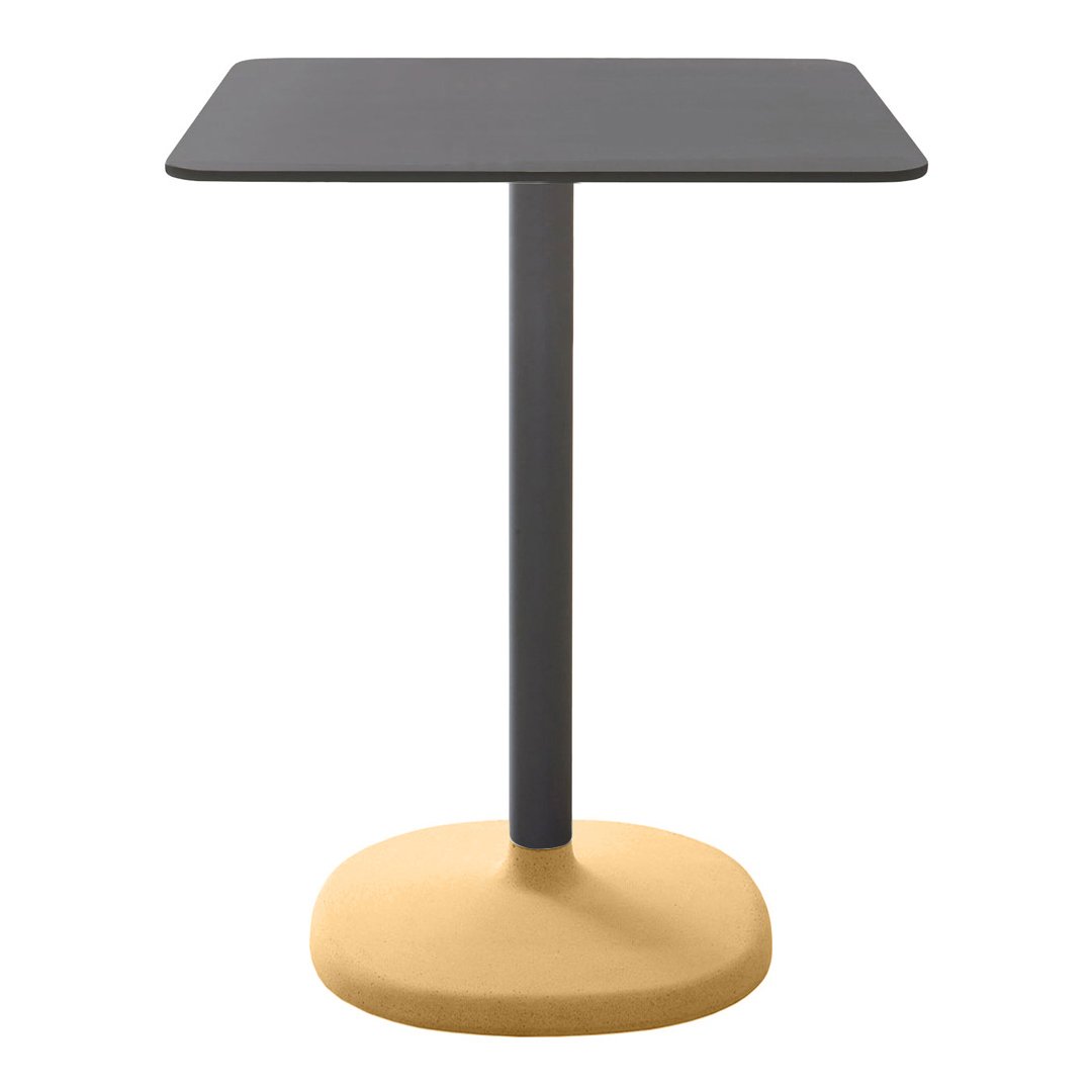 Modern square table with a sleek black top and a smooth yellow base, perfect for minimalist decor.
