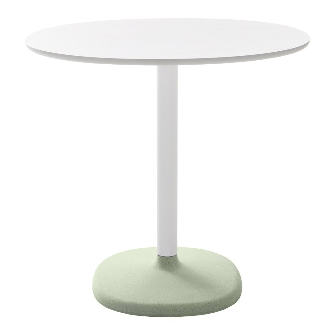 Round table with a sleek white top and a soft green base, featuring a minimalist design. Perfect for modern decor.