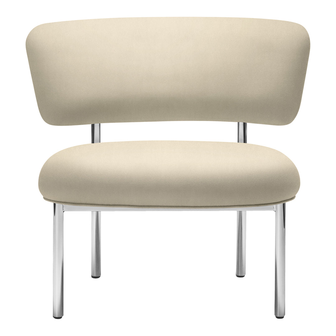 Beige upholstered chair with a smooth, curved back and chrome legs, showcasing a minimalist design.