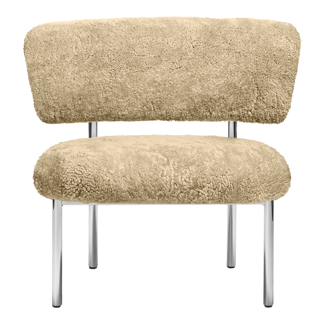 Beige textured chair with plush upholstery and sleek chrome legs, perfect for modern decor.