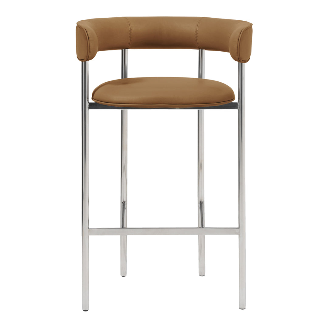 Tan upholstered bar stool with a sleek chrome frame, featuring a minimalist design and modern aesthetic.