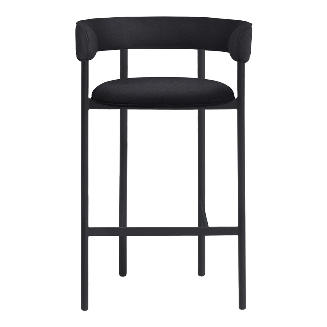 Black bar stool with sleek design and minimalistic pattern, featuring a comfortable upholstered seat and sturdy frame.
