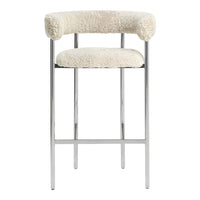 Cream-colored bar stool with a plush, textured fabric and sleek chrome legs. Ideal for modern decor.
