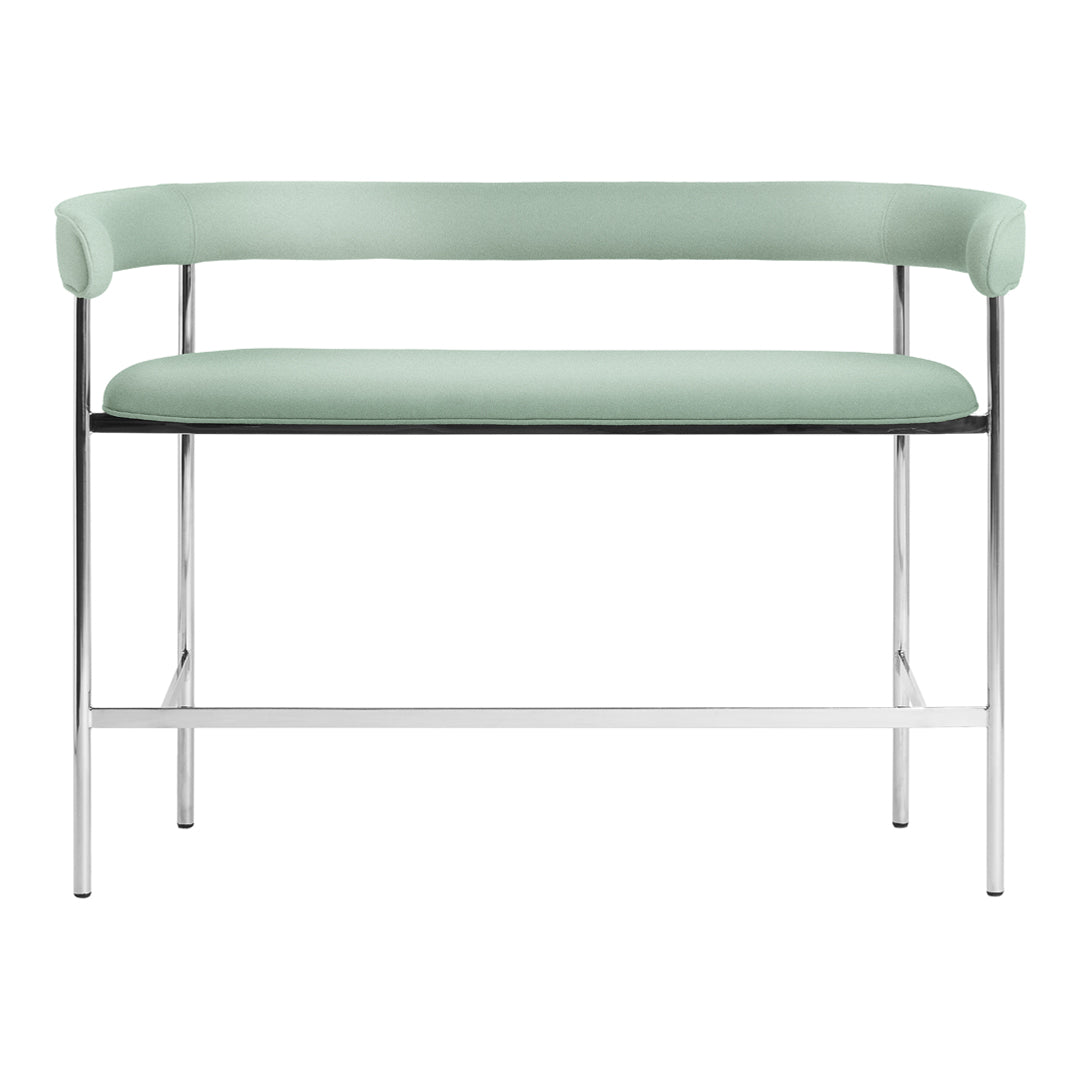 Mint green upholstered bench with a sleek chrome frame, featuring a minimalist design and smooth surfaces.