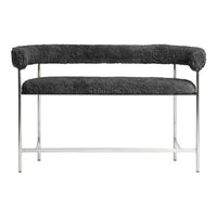 Modern bench in soft gray upholstery with textured pattern and sleek chrome frame. Ideal for contemporary decor.
