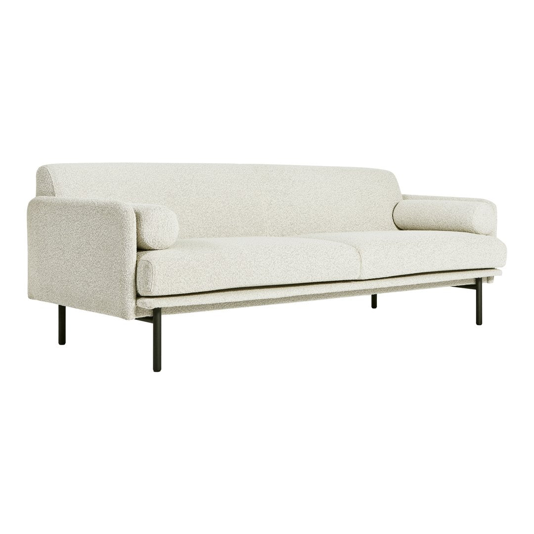 Light beige upholstered sofa with a minimalist design and solid black metal legs. Ideal for modern interiors.