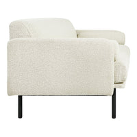 Cozy cream-colored sofa with a textured, boucle fabric and sleek black metal legs, perfect for modern interiors.