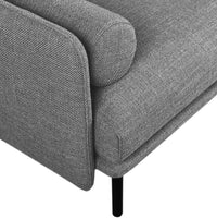 Gray upholstery with a subtle herringbone pattern, featuring sleek black legs for a modern touch.